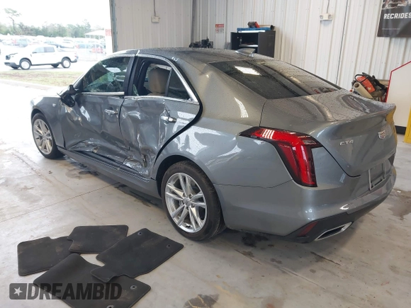 2021 Cadillac CT4 Luxury with VIN 1G6DA5RK4M0147723, listed as a IAAI auction lot 41646082 with 14,459 mi miles and . Bid and sale history available at DreamBid. Image 3.