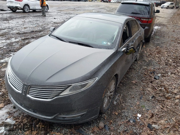 2015 Lincoln MKZ with VIN 3LN6L2J97FR616714, listed as a IAAI auction lot 41664184 with 116,495 mi miles and . Bid and sale history available at DreamBid. Image 17.