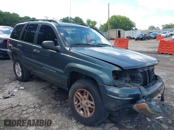 2004 Jeep Grand Cherokee Laredo with VIN 1J4GX48S34C192181, listed as a IAAI auction lot 42320368 with 181,415 mi miles and . Bid and sale history available at DreamBid. Image 13.
