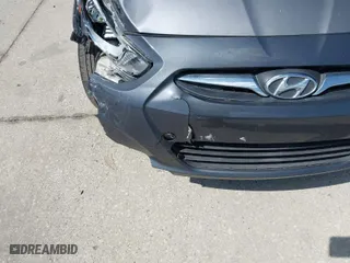2014 Hyundai Accent GLS with VIN KMHCT4AE4EU661497, listed as a IAAI auction lot 41987134 with 129,508 mi miles. Bid and sale history available at carsss.com. Image 6.