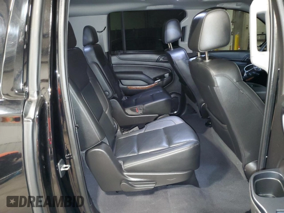 2019 Chevrolet Suburban Premier with VIN 1GNSKJKC7KR140553, listed as a Copart auction lot 83027274 with 89,835 mi miles and Salvage Title. Bid and sale history available at DreamBid. Image 11.
