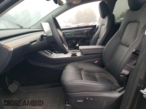 2025 Tesla Model Y Long Range z VIN 7SAYGDED9SF269767, wystawiony jako Copart lot #51588985 z przebiegiem 1 943 mil mil oraz Szkoda całkowita • Salvage title. Historia ofert i sprzedaży dostępna na DreamBid. Obrazek 7.