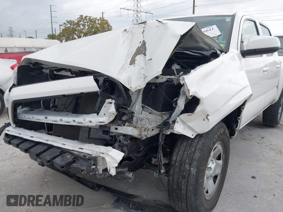 2022 Toyota Tacoma SR with VIN 3TMCZ5AN7NM470444, listed as a IAAI auction lot 41729041 with 34,248 mi miles and . Bid and sale history available at DreamBid. Image 6.