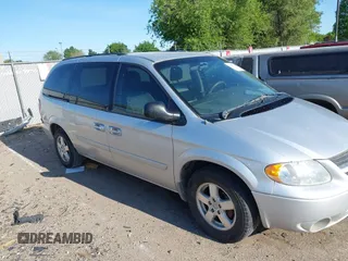 2006 Dodge Grand Caravan SXT z VIN 2D4GP44L96R896421, wystawiony jako IAAI lot #42381987 z przebiegiem Nie podano mil oraz . Historia ofert i sprzedaży dostępna na DreamBid. Obrazek 1.