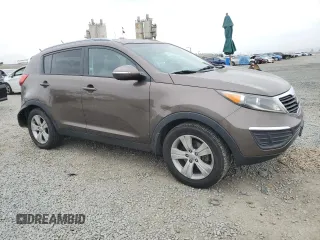 2013 Kia Sportage LX with VIN KNDPB3A20D7511165, listed as a Copart auction lot 52822635 with 190,219 mi miles and Salvage Title. Bid and sale history available at carsss.com. Image 4.