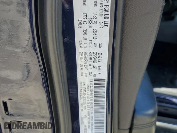 2018 Dodge Durango SXT with VIN 1C4RDJAG4JC161335, listed as a Copart auction lot 57243095 with 74,690 mi miles and Salvage title. Bid and sale history available at DreamBid. Image 13.