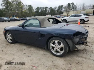2000 Porsche Boxster z VIN WP0CA2987YU623473, wystawiony jako Copart lot #46845945 z przebiegiem 72 104 mil mil oraz Szkoda całkowita • Salvage title. Historia ofert i sprzedaży dostępna na DreamBid. Obrazek 2.