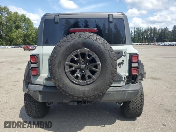 2023 Ford Bronco Raptor z VIN 1FMEE5JR7PLA93752, wystawiony jako Copart lot #57440075 z przebiegiem 33 549 mil mil oraz Szkody całkowita. Historia ofert i sprzedaży dostępna na DreamBid. Obrazek 6.
