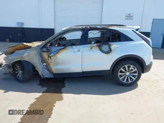 2020 Cadillac XT4 FWD Sport with VIN 1GYFZER44LF029323, listed as a IAAI auction lot 41906596 with Not Provided miles and . Bid and sale history available at carsss.com. Image 13.
