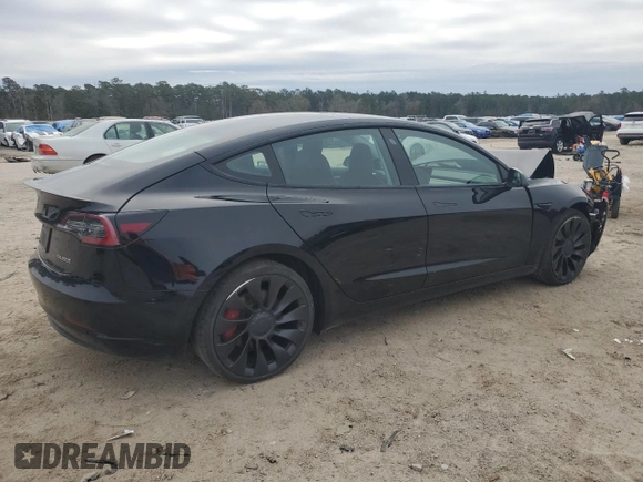 2022 Tesla Model 3 Performance with VIN 5YJ3E1EC1NF267857, listed as a Copart auction lot 88029995 with 38,080 mi miles and Salvage Title. Bid and sale history available at DreamBid. Image 3.