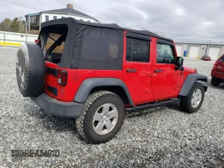 2015 Jeep Wrangler Unlimited Willys Wheeler with VIN 1C4BJWDG2FL542045, listed as a Copart auction lot 52903465 with 86,205 mi miles and Clean Title. Bid and sale history available at DreamBid. Image 3.