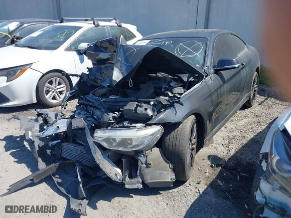 2015 BMW 4 Series 428i with VIN WBA3N7C51FK224791, listed as a IAAI auction lot 41686556 with NaN miles. Bid and sale history available at carsss.com. Image 2.