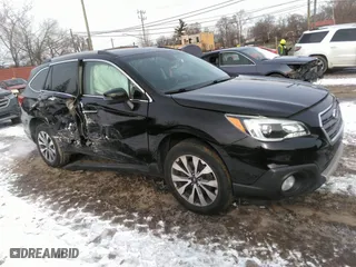 2017 Subaru Outback Touring with VIN 4S4BSETC9H3329789, listed as a IAAI auction lot 41553614 with 73,852 mi miles. Bid and sale history available at carsss.com. Image 1.