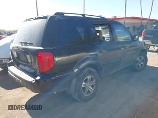 2005 Honda Pilot EX with VIN 5FNYF18455B044034, listed as a IAAI auction lot 42078473 with 265,726 mi miles. Bid and sale history available at carsss.com. Image 4.