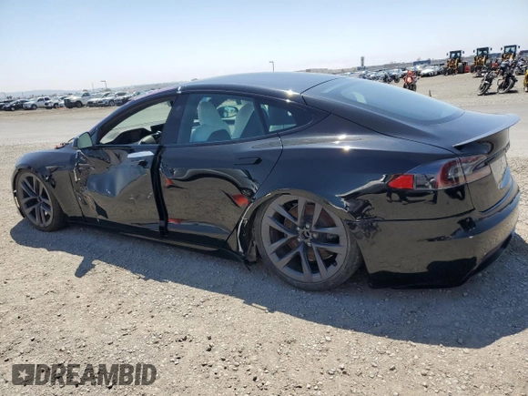 2022 Tesla Model S Plaid with VIN 5YJSA1E69NF460808, listed as a Copart auction lot 55181095 with 12,836 mi miles and Salvage Title. Bid and sale history available at DreamBid. Image 2.