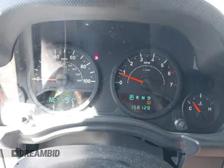 2008 Jeep Wrangler Unlimited X with VIN 1J4GA39168L592999, listed as a IAAI auction lot 42699909 with 158,128 mi miles and . Bid and sale history available at DreamBid. Image 7.