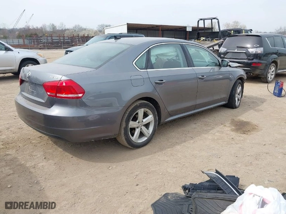 2014 Volkswagen Passat SE w/Sunroof with VIN 1VWBT7A38EC061391, listed as a IAAI auction lot 41763992 with 134,974 mi miles. Bid and sale history available at carsss.com. Image 4.