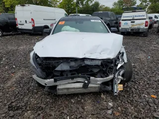 2018 Genesis G80 3.3T Sport with VIN KMHGN4JB3JU248921, listed as a Copart auction lot 71305654 with 73,718 mi miles and Salvage Title. Bid and sale history available at carsss.com. Image 5.