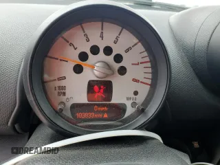 2014 MINI Countryman z VIN WMWZB3C56EWM32118, wystawiony jako Copart lot #59548875 z przebiegiem 103 833 mil mil oraz Szkoda całkowita • Salvage title. Historia ofert i sprzedaży dostępna na DreamBid. Obrazek 9.