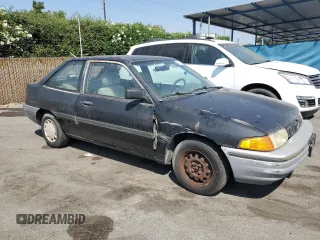 1992 Ford Escort z VIN 1FAPP11JXNW156984, wystawiony jako Copart lot #63462264 z przebiegiem 37 774 mil mil oraz Szkoda całkowita • Salvage title. Historia ofert i sprzedaży dostępna na DreamBid. Obrazek 4.