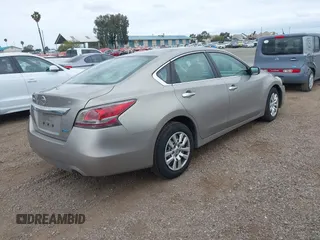 2014 Nissan Altima SV with VIN 1N4AL3AP9EN363762, listed as a IAAI auction lot 42128232 with 114,006 mi miles and . Bid and sale history available at carsss.com. Image 4.