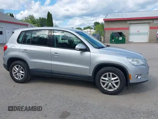 2011 Volkswagen Tiguan SEL z VIN WVGBV7AX5BW548053, wystawiony jako IAAI lot #42401994 z przebiegiem 184 299 mil mil oraz . Historia ofert i sprzedaży dostępna na DreamBid. Obrazek 14.