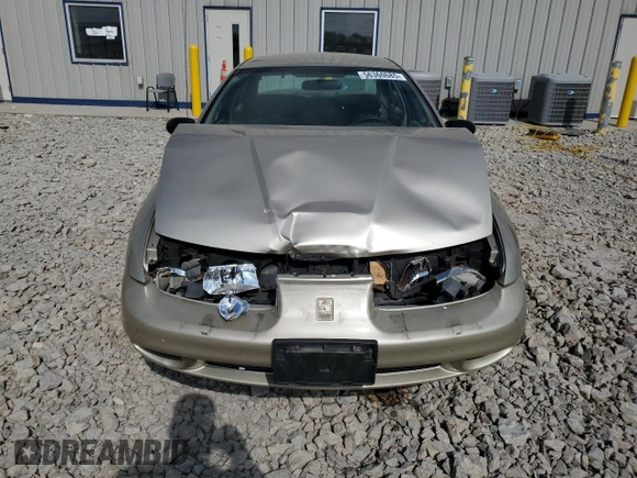 2001 Saturn SL z VIN 1G8ZK52741Z200069, wystawiony jako Copart lot #56360685 z przebiegiem 115 673 mil mil oraz Nie do naprawy. Historia ofert i sprzedaży dostępna na DreamBid. Obrazek 5.
