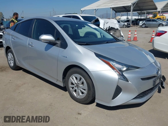 2018 Toyota Prius Two with VIN JTDKBRFU6J3068322, listed as a IAAI auction lot 42001483 with 57,597 mi miles. Bid and sale history available at carsss.com. Image 1.