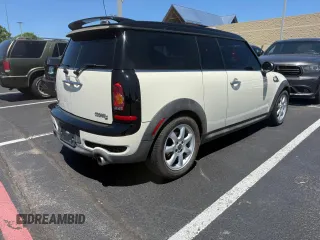 2010 MINI Clubman S z VIN WMWMM3C51ATP94180, wystawiony jako Copart lot #58029585 z przebiegiem 117 560 mil mil oraz Tytuł czysty. Historia ofert i sprzedaży dostępna na DreamBid. Obrazek 4.
