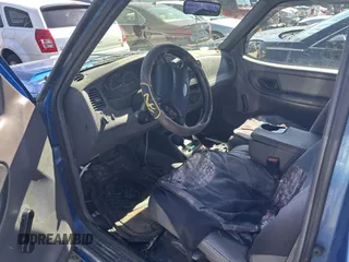 2001 Ford Ranger XL with VIN 1FTYR10UX1TA91831, listed as a IAAI auction lot 42075599 with 201,269 mi miles and . Bid and sale history available at carsss.com. Image 5.