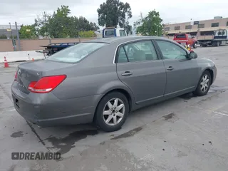 2007 Toyota Avalon XL with VIN 4T1BK36B47U175248, listed as a IAAI auction lot 42126427 with 144,284 mi miles. Bid and sale history available at carsss.com. Image 4.
