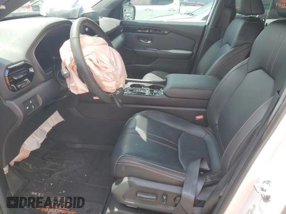 2024 Honda Pilot TrailSport z VIN 5FNYG1H60RB045659, wystawiony jako Copart lot #58575955 z przebiegiem 16 681 mil mil oraz Szkoda całkowita • Salvage title. Historia ofert i sprzedaży dostępna na DreamBid. Obrazek 7.
