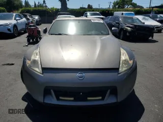 2010 Nissan 370Z z VIN JN1AZ4EH5AM500121, wystawiony jako Copart lot #58411355 z przebiegiem 146 943 mil mil oraz Tytuł czysty. Historia ofert i sprzedaży dostępna na DreamBid. Obrazek 5.