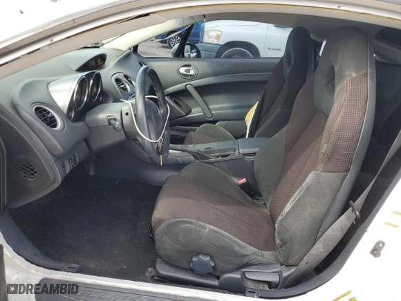 2009 Mitsubishi Eclipse GS with VIN 4A3AK24F19E038830, listed as a Copart auction lot 79469074 with 69,706 mi miles and Salvage Title. Bid and sale history available at carsss.com. Image 7.