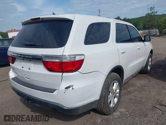 2013 Dodge Durango SXT with VIN 1C4RDJAG4DC512491, listed as a IAAI auction lot 42276406 with 219,766 mi miles and . Bid and sale history available at DreamBid. Image 4.
