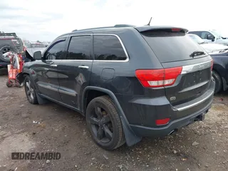 2012 Jeep Grand Cherokee Overland with VIN 1C4RJECT7CC334116, listed as a IAAI auction lot 40968071 with 98,794 mi miles. Bid and sale history available at carsss.com. Image 3.