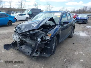 2015 Mazda CX-5 Sport with VIN JM3KE4BY3F0503011, listed as a IAAI auction lot 41973501 with 191,064 mi miles and . Bid and sale history available at carsss.com. Image 18.