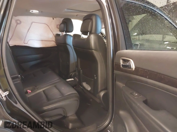 2012 Jeep Grand Cherokee Laredo with VIN 1C4RJFAT1CC225479, listed as a IAAI auction lot 41709911 with 227,150 mi miles. Bid and sale history available at carsss.com. Image 8.
