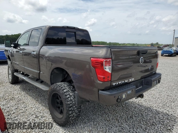 2017 Nissan Titan SL z VIN 1N6BA1F27HN547900, wystawiony jako Copart lot #61768145 z przebiegiem 148 383 mil mil oraz Szkoda całkowita • Salvage title. Historia ofert i sprzedaży dostępna na DreamBid. Obrazek 2.