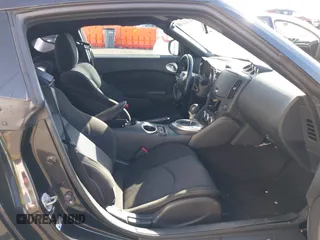 2013 Nissan 370Z with VIN JN1AZ4EH1DM880739, listed as a IAAI auction lot 40474120 with 76,369 mi miles. Bid and sale history available at carsss.com. Image 5.