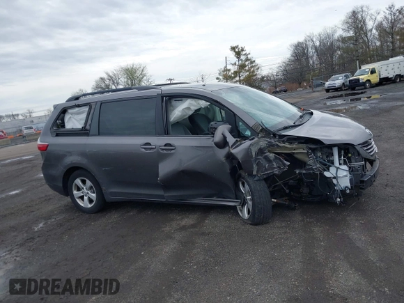 2015 Toyota Sienna LE AAS with VIN 5TDKK3DC1FS615090, listed as a IAAI auction lot 41965112 with 116,745 mi miles. Bid and sale history available at carsss.com. Image 13.