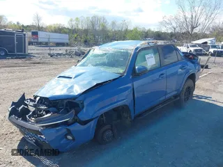 2018 Toyota 4Runner SR5 with VIN JTEBU5JR2J5555619, listed as a IAAI auction lot 42045308 with 103,812 mi miles. Bid and sale history available at carsss.com. Image 2.