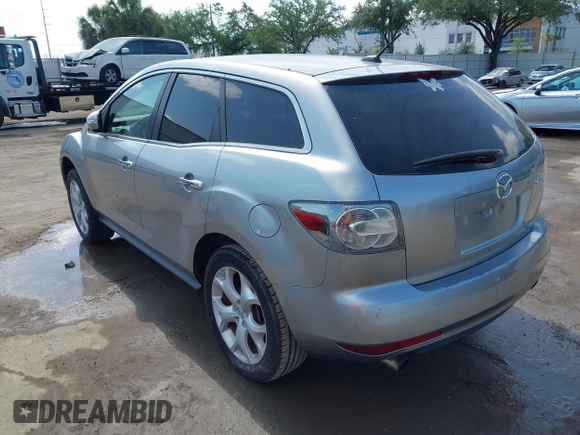 2010 Mazda CX-7 Touring with VIN JM3ER2W31A0348858, listed as a IAAI auction lot 42084790 with 136,261 mi miles. Bid and sale history available at carsss.com. Image 3.