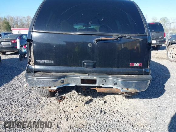 2004 GMC Yukon SLT with VIN 1GKEK13Z34R136256, listed as a IAAI auction lot 42122862 with 263,607 mi miles. Bid and sale history available at carsss.com. Image 6.