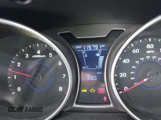 2013 Hyundai Veloster w/Black Int with VIN KMHTC6AD9DU171722, listed as a IAAI auction lot 41617721 with 115,791 mi miles and . Bid and sale history available at DreamBid. Image 7.