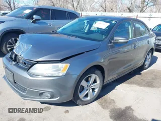 2012 Volkswagen Jetta TDI w/Premium & Nav z VIN 3VWLL7AJ5CM361646, wystawiony jako IAAI lot #41856672 z przebiegiem 190 292 mil mil oraz . Historia ofert i sprzedaży dostępna na DreamBid. Obrazek 17.