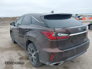 2016 Lexus RX 350 z VIN 2T2ZZMCA5GC029529, wystawiony jako IAAI lot #41953567 z przebiegiem 133 460 mil mil oraz . Historia ofert i sprzedaży dostępna na DreamBid. Obrazek 3.