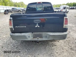 2006 Mitsubishi Raider Duro Cross z VIN 1Z7HC38K26S576434, wystawiony jako Copart lot #53798965 z przebiegiem 198 820 mil mil oraz Szkody całkowita. Historia ofert i sprzedaży dostępna na DreamBid. Obrazek 6.