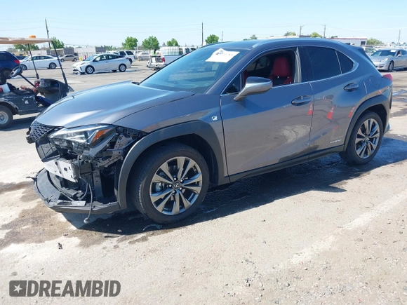 2021 Lexus UX 250h F Sport z VIN JTHR9JBH3M2052706, wystawiony jako IAAI lot #42321784 z przebiegiem 23 290 mil mil oraz . Historia ofert i sprzedaży dostępna na DreamBid. Obrazek 18.
