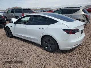 2021 Tesla Model 3 Standard Range Plus with VIN 5YJ3E1EA5MF100477, listed as a Copart auction lot 51516425 with 41,484 mi miles and Salvage Title. Bid and sale history available at carsss.com. Image 2.